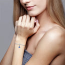 Pulseira Golden + Berloque Nossa Senhora (ÚLTIMAS UNIDADES)