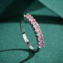 Anel Meia Aliança Zircônias Rosas Prata